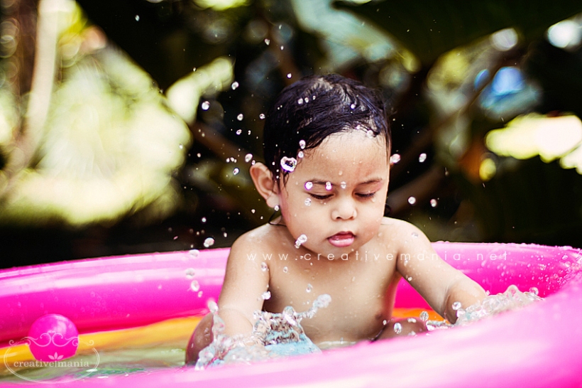 Baby Bathing in Rubber Pool